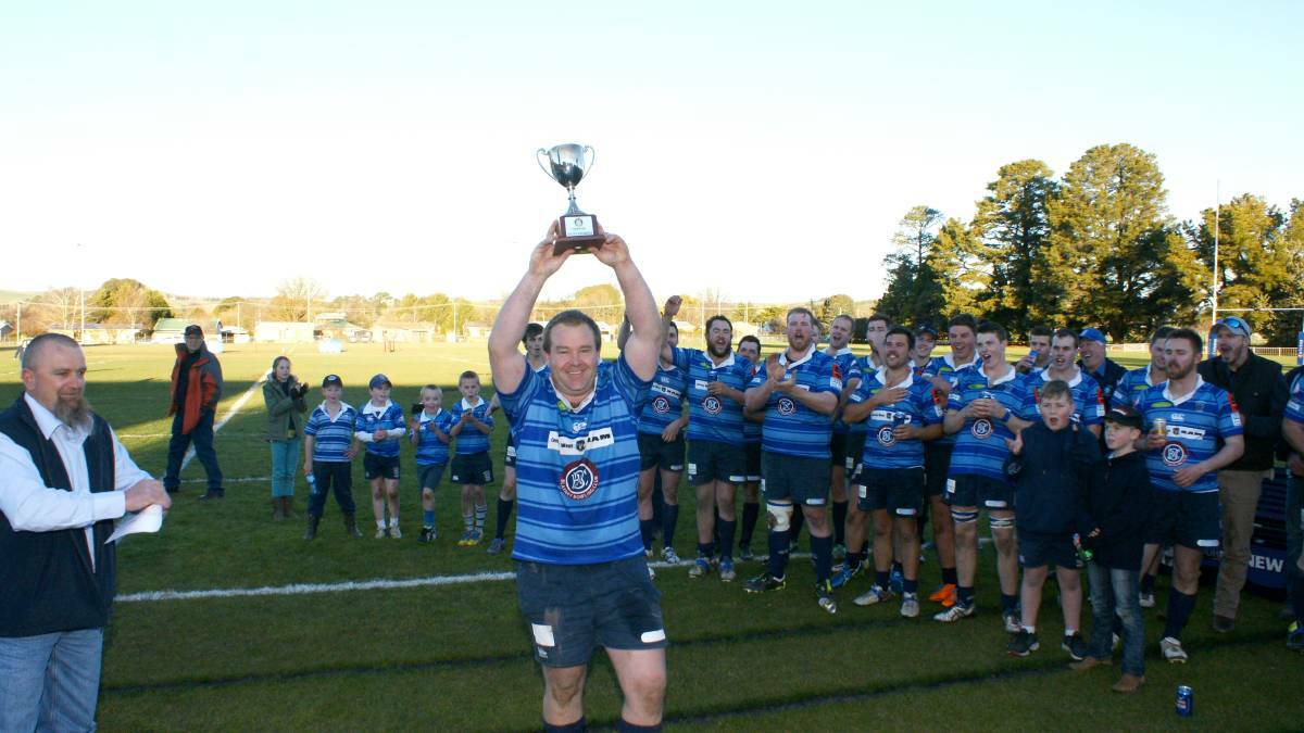 WE'RE BACK: Sam Nixon with the GrainCorp Cup southern trophy after last year's win.