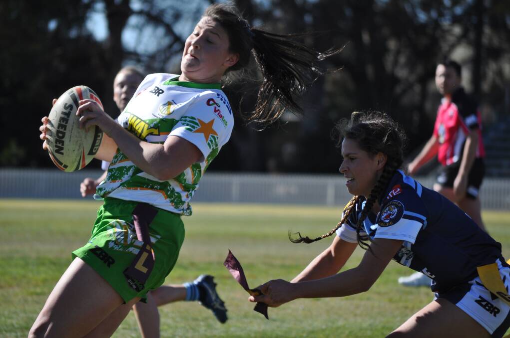 DIFFERENT SIDES OF THE LEDGER: Elise Garlick and CYMS are playing for their season, while Erin Naden and her Hawks unit is flying. Photo: NICK McGRATH