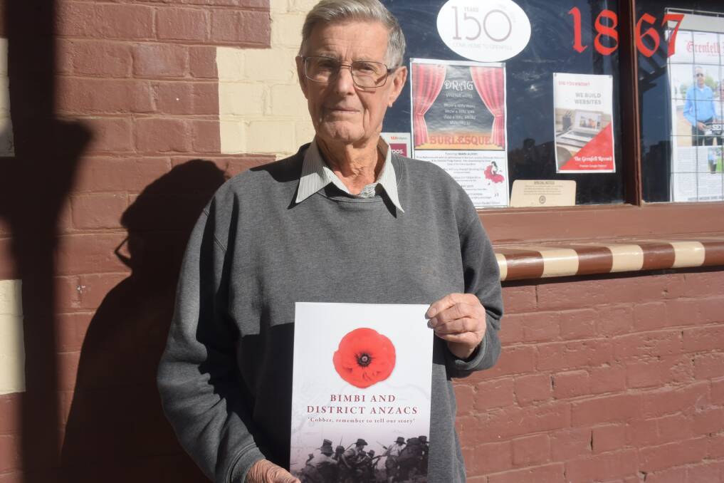Co-author Bruce Robinson of Bimbi with a copy of the newly published book titled 'Bimbi and District ANZACS' that was co-written with Margaret Nowlan-Jones.