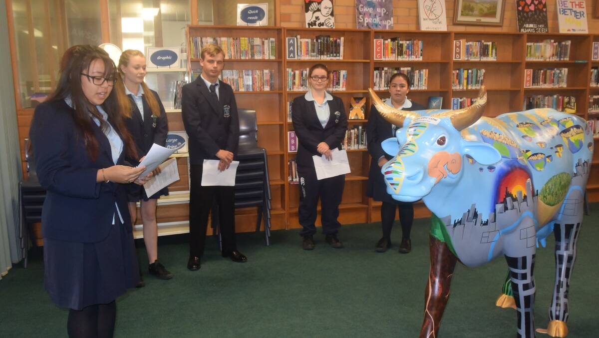 THLHS students explain to the judges what they have learnt from their creation during this year's competition.