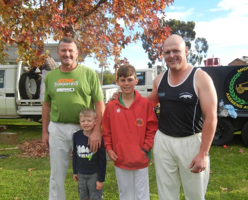 Grenfell axeman Matt Reid (R) and his son Billie with Dale Ryan (R) and his son Jack.
