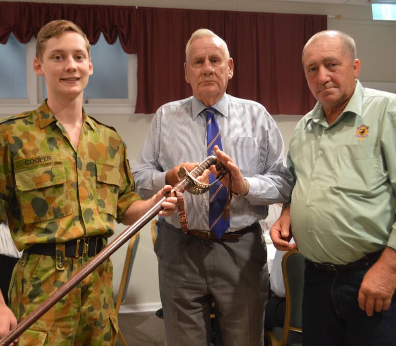 Cadet of the Year Corporal Jack Cooper with RSL President Maurice Simpson and Bowling Club representative Wayne Gavin.


