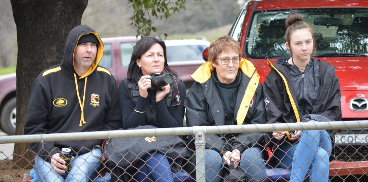 SPECTATORS:  Rodney and Sonia Cotter, Sandra Hughes and Bianca Cotter watching the Goannas at Lawson Oval.

