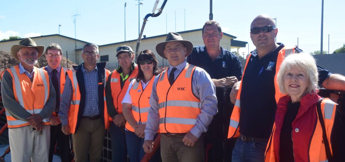 Weddin Shire Councillors and senior staff members with Gino Gigliotti, owner of ICON Industries and Angelo Spina, project manager on site at the Aquatic Centre construction.