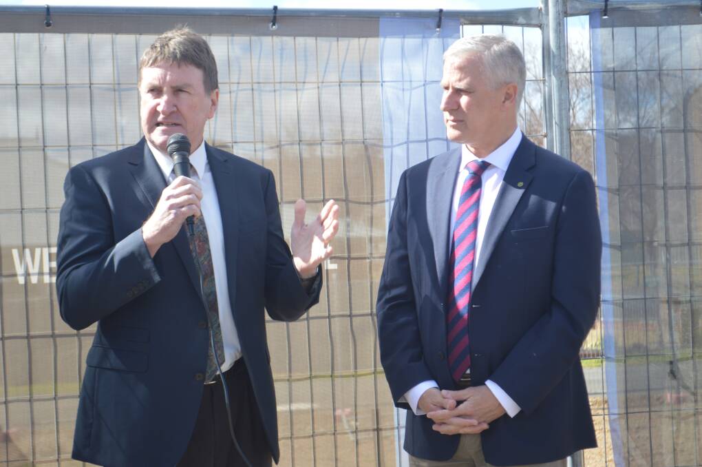 Weddin Shire General Manager Glenn Carroll addresses the crowd with Member for Riverina Michael McCormack at the official funding announcement for Grenfell's new medical centre.