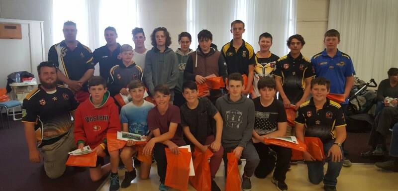 The U14s team with coaches Alec Abbott, Mitch Stevens and Trevor Mawhinney. Photo GJRLFC.