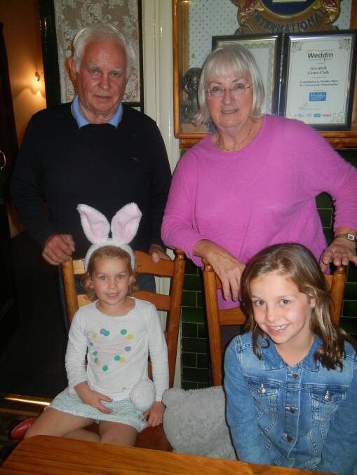 Saskia (in bunny ears) and her sister Geneveive with grandparents Ron and Jan McLelland.