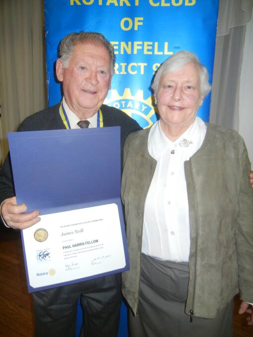 Jim Neill recipient of a Paul Harris Fellow with President Margaret Bradshaw Jones. 