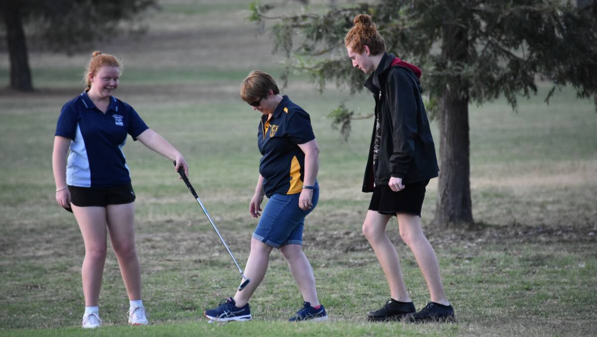 Kate Johnson (M) with daughter Jade and son Jack playing a game of birthday golf.