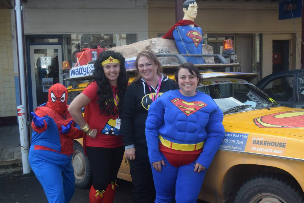 These superhero fans made a grand statement with their excellent costumes and car decorations. 