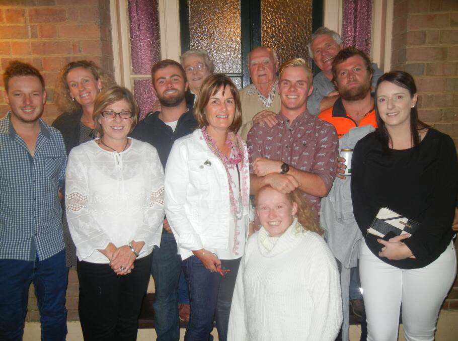 Andrew Johnson  (C-2nd from L)  with family and friends at his 21st birthday celebrations.