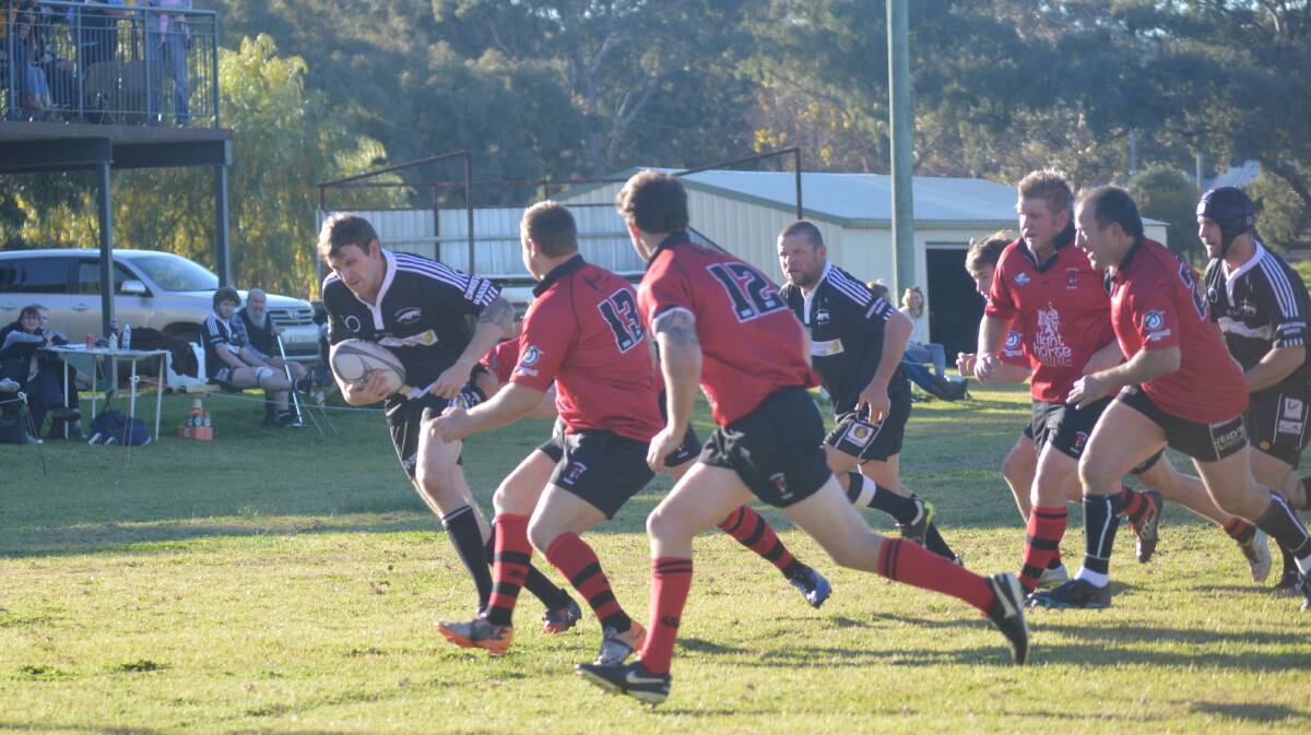 Panther Jim McClelland gets past the opposition in last weekend's home game.