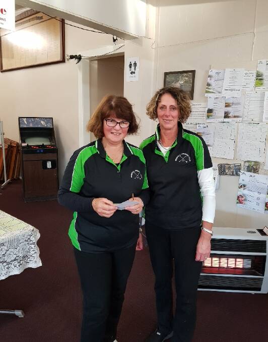Winner of the B Grade Scratch was Jan Myers (R) pictured with Val Forsyth presenting the award.
