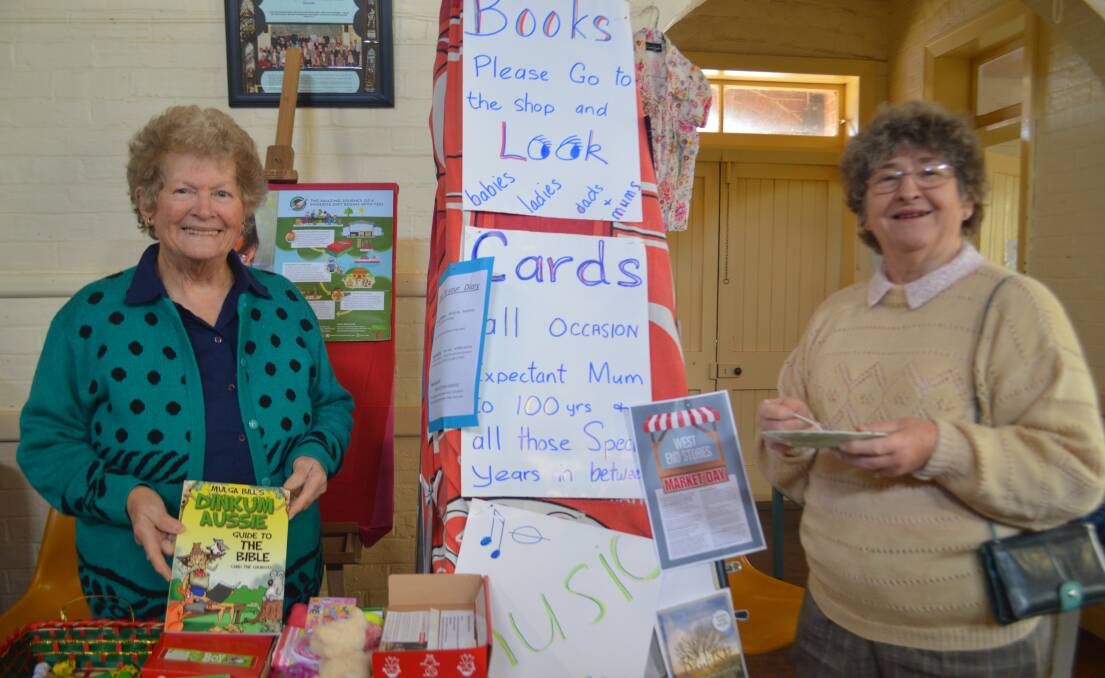 At the Anglican fete book stall are Betty Fittler and Naomi Steinhardt. 