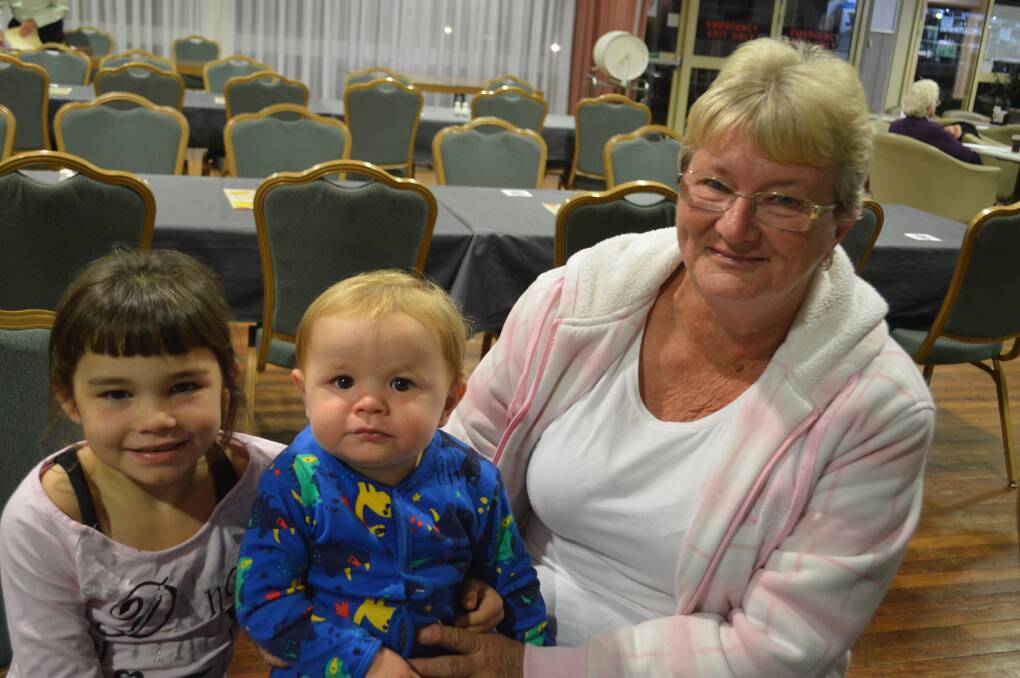 Trish Brown enjoys dinner at the Grenfell Bowling Club with grandchildren Kiara and Levi.
