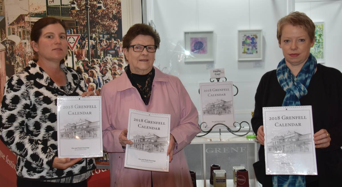 Weddin Shire Economical Development officer Auburn Carr, Joan Bolton OAM and Weddin Shire Arts and Tourism officer Verdel Maclean with the 2018 calendars.