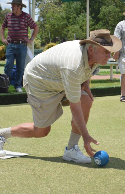 Barry Jones delivers a bowl at the bowling club last week.
