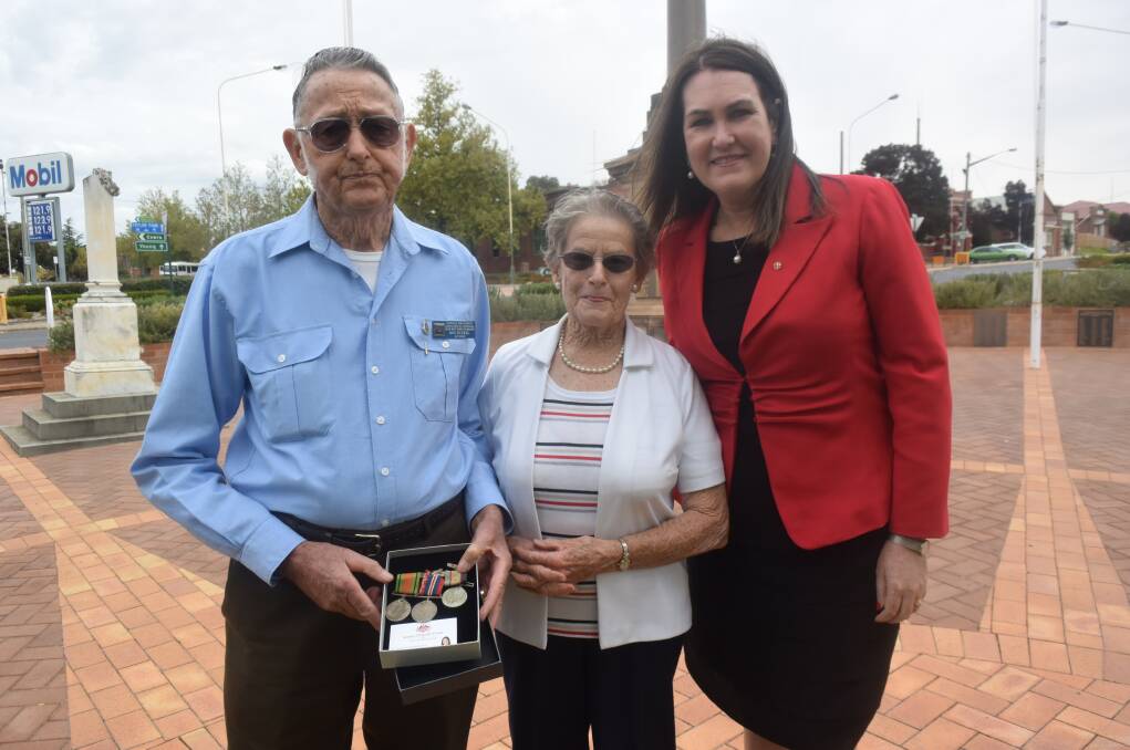 Ron and Eunice Huckel with Senator Deborah O'Neill and the medals that belonged to Private Vivian Huckel.
