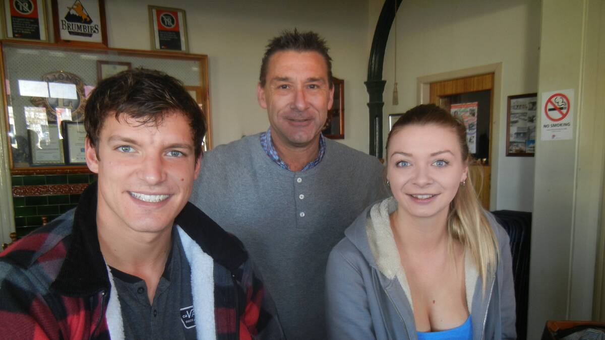 Harry Goodrum and Emily Paine from the UK with Michael Dunn (C) after the busy weekend in Grenfell.