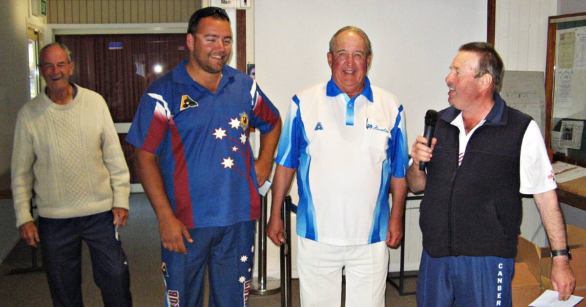 WINNERS: Tony Barry (Canberra) Sam Brown (Grenfell) and team captain Dave Hill (Canberra) are presented first prize of $1500 by John Joyce. 