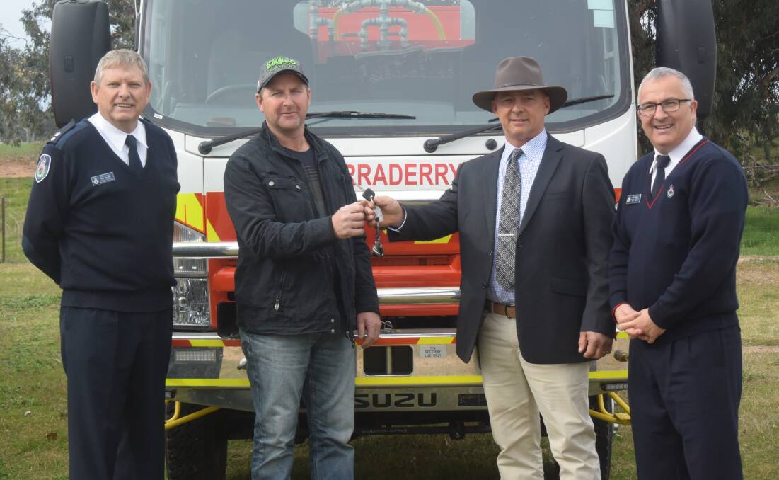 Warraderry Captain Robin Stock with Regional Manager Paul Smith, Mayor Mark Liebich and Superintendent Ken Neville.
