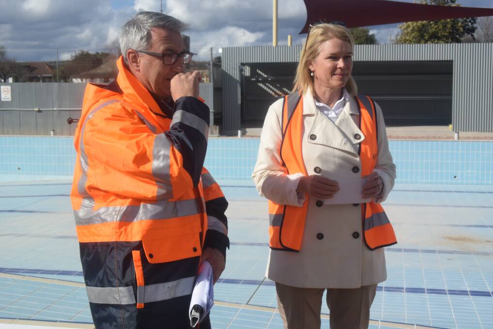 Director of Environmental Services Brendan Hayes discusses plans with Member for Cootamundra Katrina Hodgkinson.