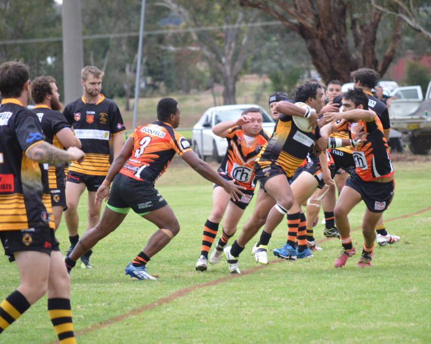Goanna Phil Ingram pushes through the Canowindra defence in last weekend's landslide victory.