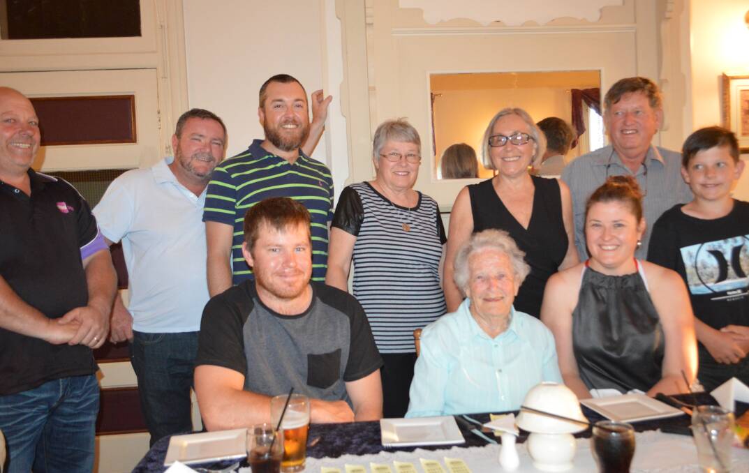 Celebrating Shirley Paterson's return to town are Wayne and Kerryn Bishop, Craig Reid, Tim Pease, Rae Pease, Stephen, Jill and Mark Griffin and Nic Bishop. 