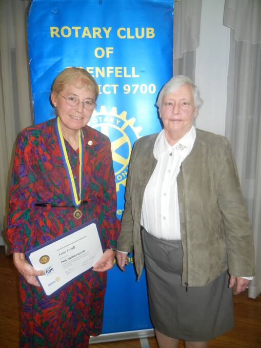 Ann Gault the recipient of a Paul Harris Fellow with President Margaret Bradshaw Jones.