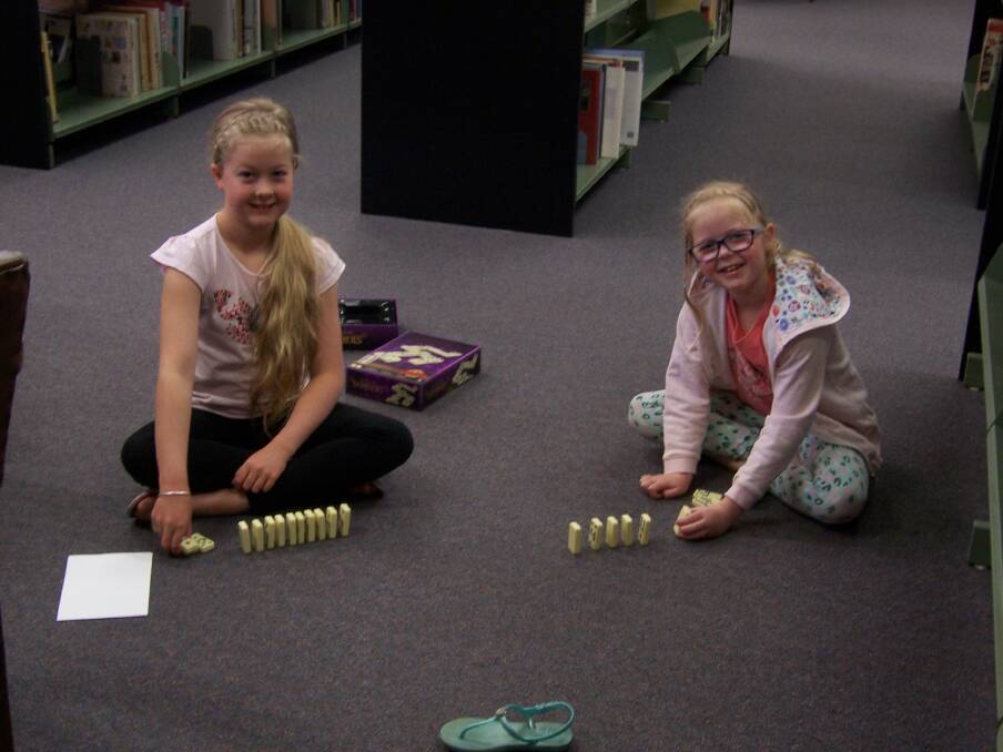 The dominos were a big hit among the children during games day at the Grenfell library. Photo E Kearnes.