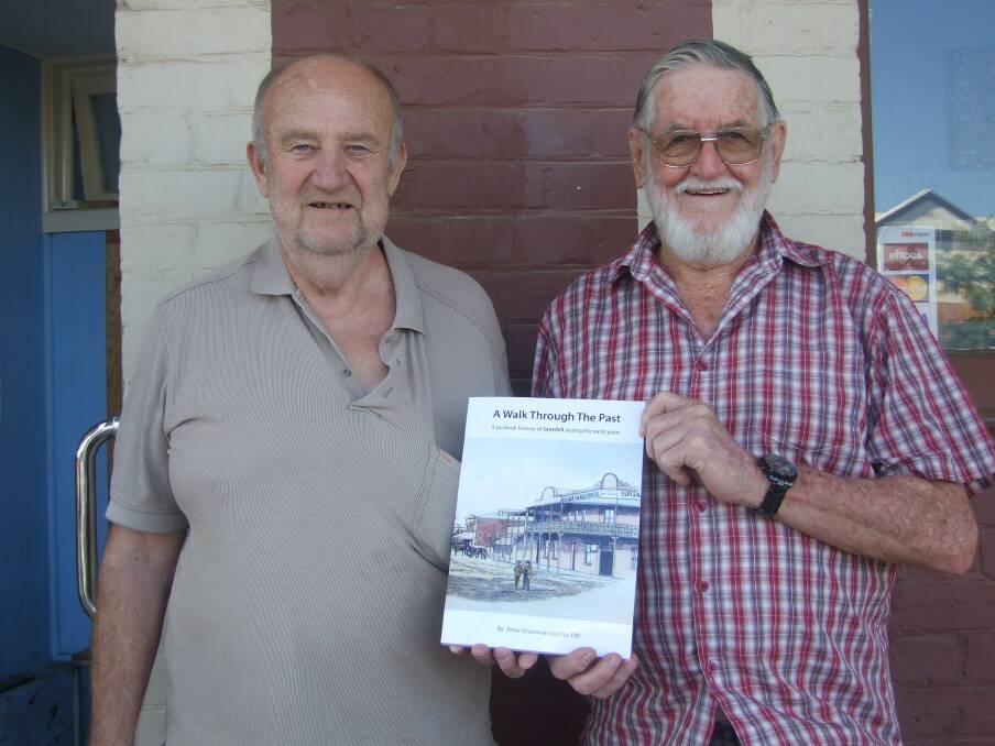 Peter Grossman and Ian Pitt with the Grenfell history book.