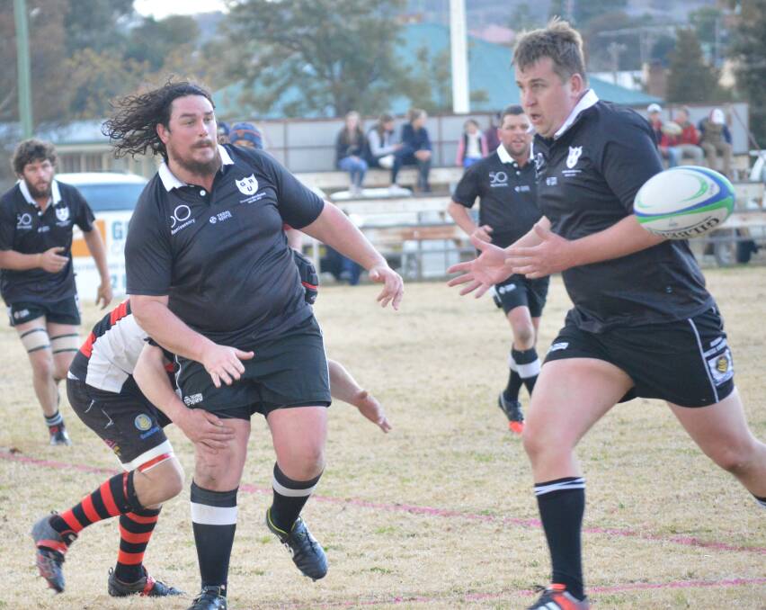 The Panthers smash through the West Wyalong opponents in last Saturday's club re-union match.
