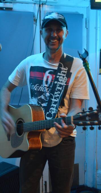GPS teacher Brent Cartwright strumming some tunes at the recent Open Mic night at the Cri.


