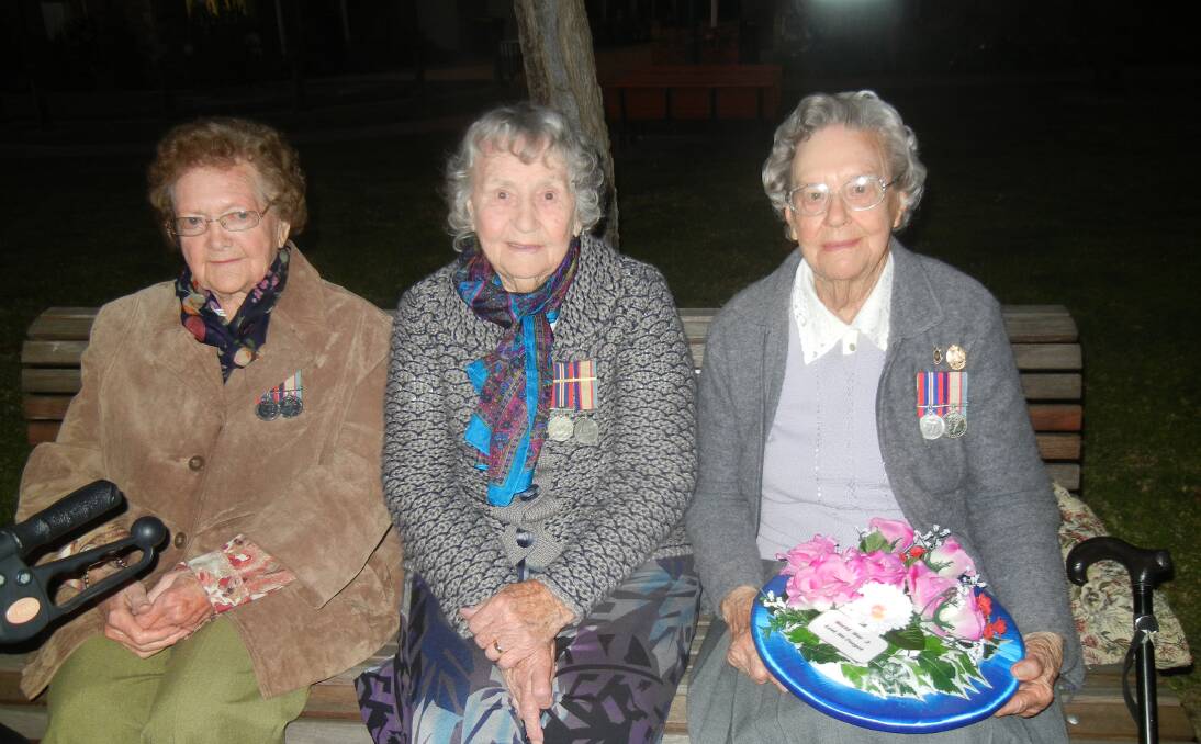 Ex-servicewomen Eunice Clarke, Meg Grant and Ted Simpson at last year's Long Tan Day service.