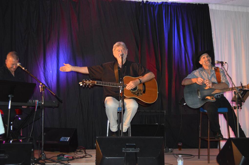 John Schumann performs with friends at the Grenfell Country Club.


