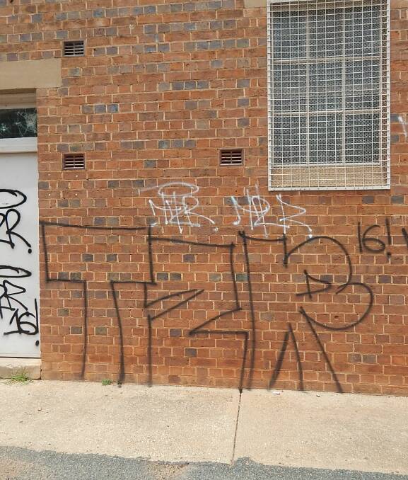 Graffiti was sprayed over bins, doors and walls at Lawson Oval as well as a school bus parked in town, the Grenfell NSW Fire and Rescue building and signage at O'Brien's Hill.