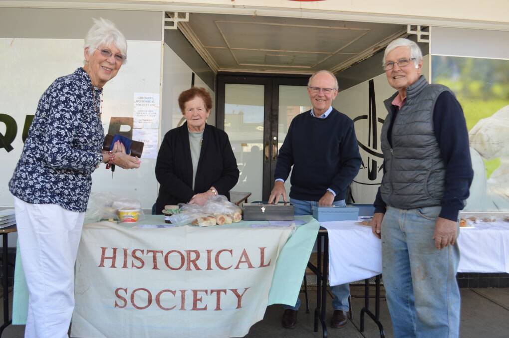 Pat Brus, Judy Mitton, Hugh Moffitt and Colin Wood at the Historical Society street stall last Saturday October 7.