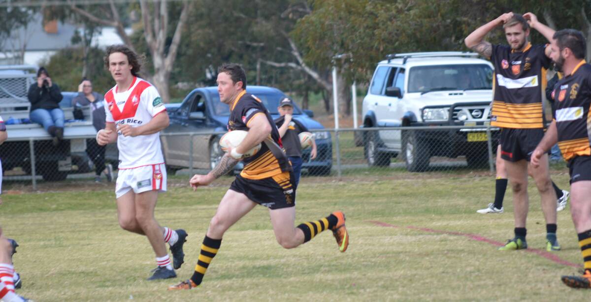 Goanna Jeremy D'Ombrain takes off down the field during a recent game at Lawson Oval.
