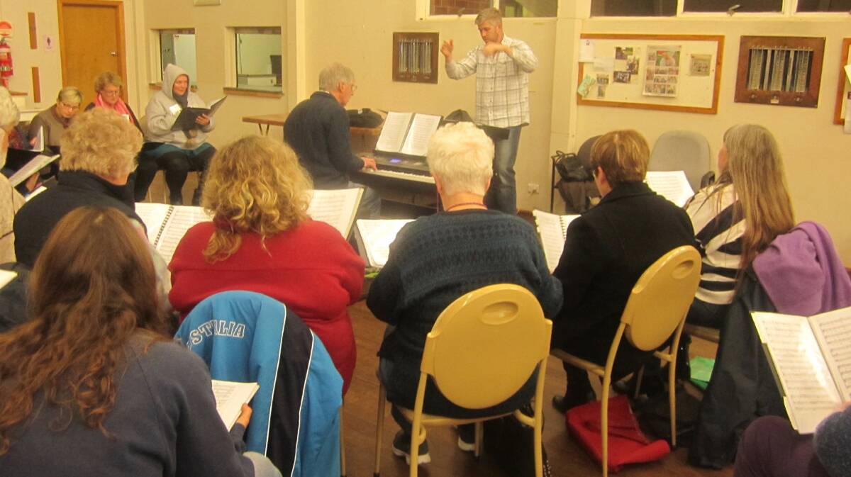  A section of Hilltops Choir in rehearsal at the Uniting Church Hall, Young. 