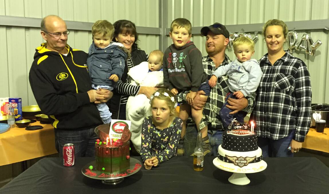 Scotty Liebich (R) and Garry Hewen with their family celebrating their birthdays.