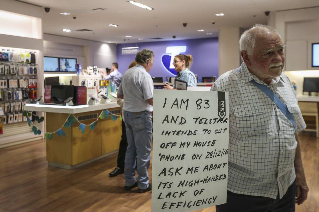 Left hanging: Upset with Telstra, Wodonga grandfather Peter Leigh-Lancaster decided to protest against the telecommunications giant at its Wodonga store. 