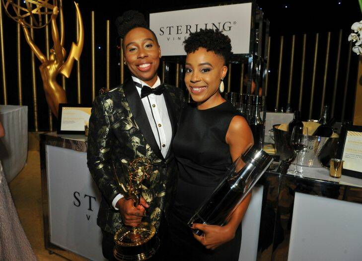 Lena Waithe, left, and Alana Mayo with a personalized bottle of Iridium Cabernet in 2017 Emmy Winners Circle hosted by Sterling Vineyards at the 69th Primetime Emmy Awards Governors Ball on Sunday, Sept. 17, 2017 at the LA Convention Center in Los Angeles. (Photo by Vince Bucci/Invision for the Television Academy/AP Images)