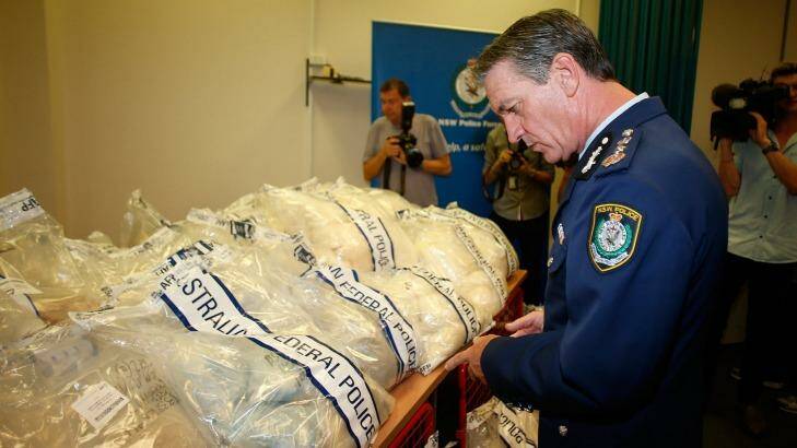 NSW Police Commissioner Andrew Scipione inspects part of the $1.5 billion drug haul that arrived from Hamburg, Germany, in furniture. Photo: Daniel Munoz
