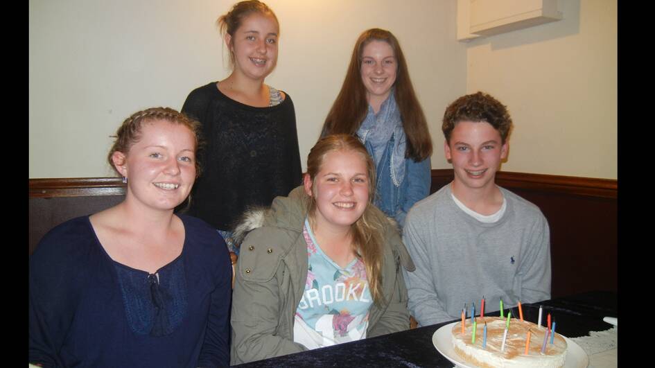 Helping Lewis Keough celebrate his 15th birthday are (BL-R) Abbey Joyce and Kiarna Caroll and (F) Hannah Joyce and Brianna Anderson.