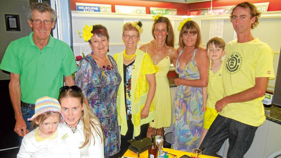 The Fanning Family enjoying the Can-Assist Yellow Day at the Criterion Hotel on Melbourne Cup Day.(L-R) Greg and Mary Fanning, Vicki Penberthy, Sally and Kim Fanning, Stuart and Don Sommerville and seated Melissa Martens and her daughter Stella. Little Jack Fanning was asleep when the photo was taken and Daniel Fanning was hard at work.