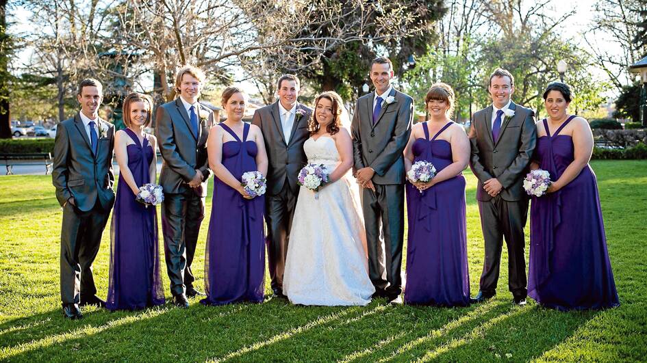 (L-R)  The bridal party of Ian Light, Felicity Taylor, Simon Rolls, Amy Kermath, groom Stephen and his new bride Tanya Kermath, Shane Kermath, Kellie Rogers, Nick Wright and Jessica Pace  photographed in the  park gardens following their marriage in Bathurst on September 27. (Photo contributed)