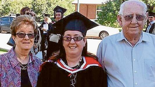 Jasmine Pipe with her proud parents Doug and Ann following her graduation with a Bachelor of Social Work Degree at Charles Sturt University Wagga on December 15.  (Photo contributed)
 