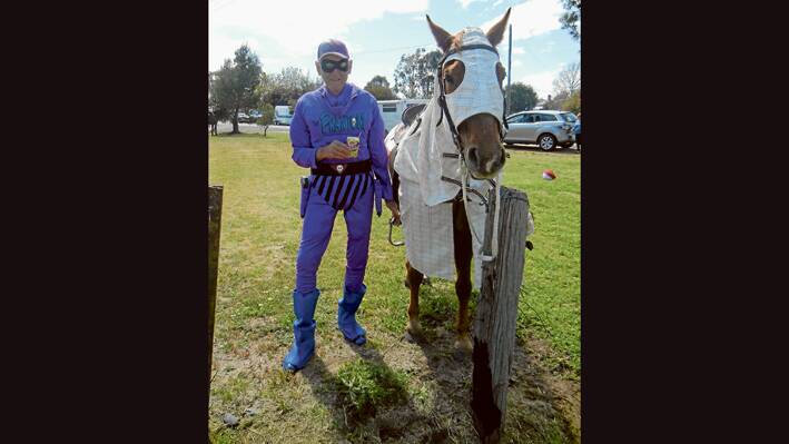 Warren Ryan as “The Phantom” and his trusty steed “Hero” (alias Jimmy) won the Best Dressed individual during the parade through the Streets of Grenfell at the Weddin Mountain Muster. 