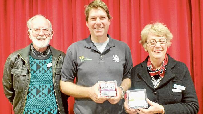 Progressive and innovative farmer Ed Fagan (centre), holding samples of Cryovac Beetroot, with President Bev Kelly, and Nev Clark who in the past had a long time association with Ed’s father Peter Fagan through contract vegetable farming on “Mulyan”.
 