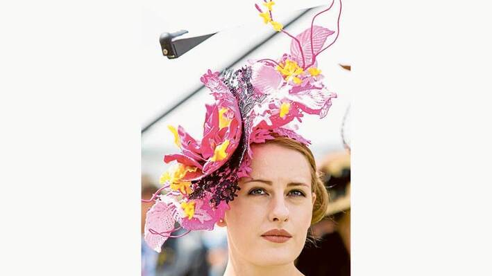 Modelling the spectacular "Lisa Schaefer Millinery" entry in the Myer Fashions on the Field Millinery competition at this years Melbourne Cup Crown Oaks Day is Alice Fennell. 